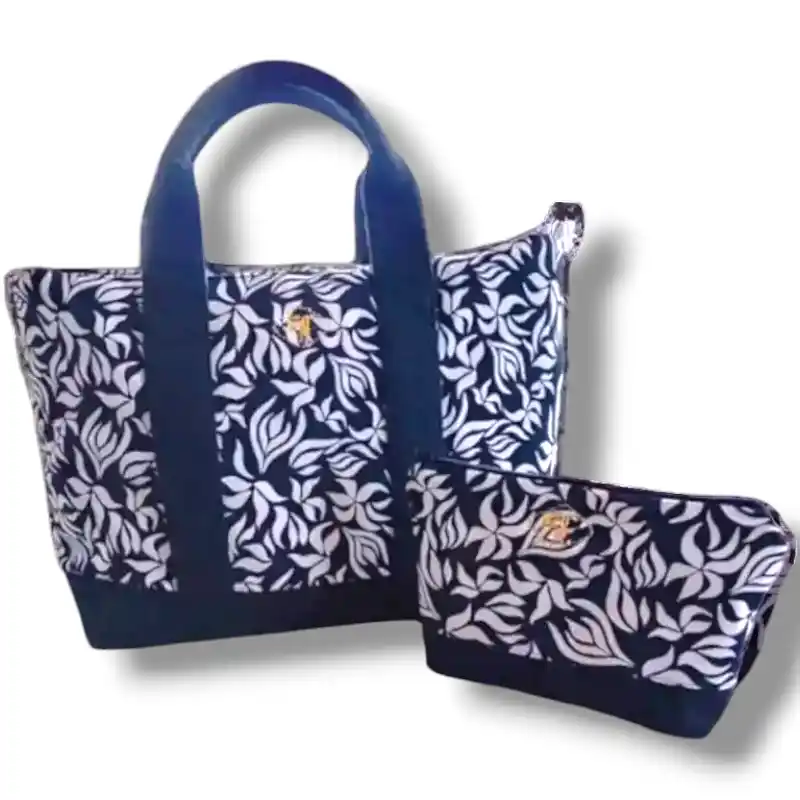 borsa in tessuto floreale bianco e nero con pochette abbinata